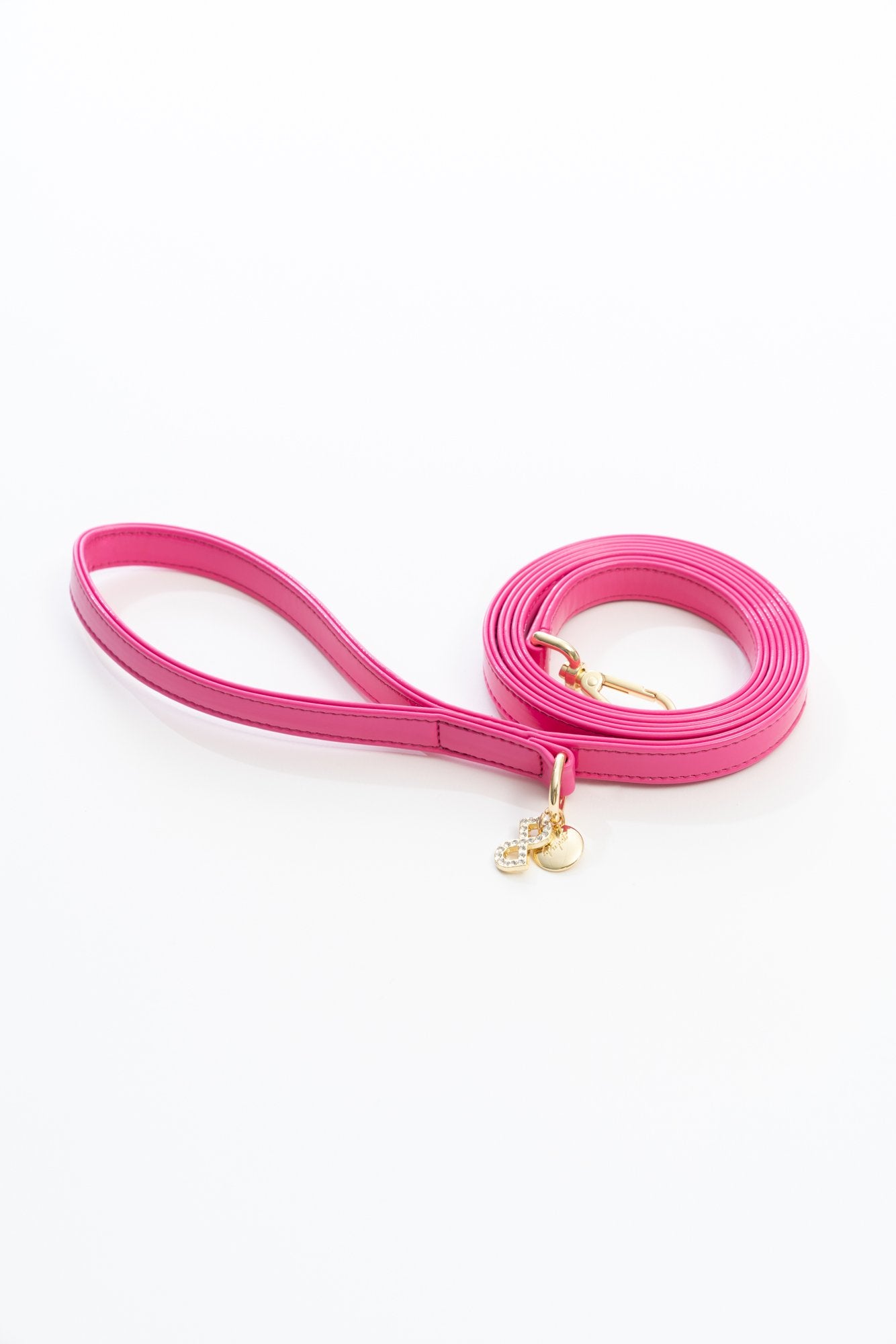GUINZAGLIO PER CANI IN VERNICE CON FINITURE ORO FUCSIA