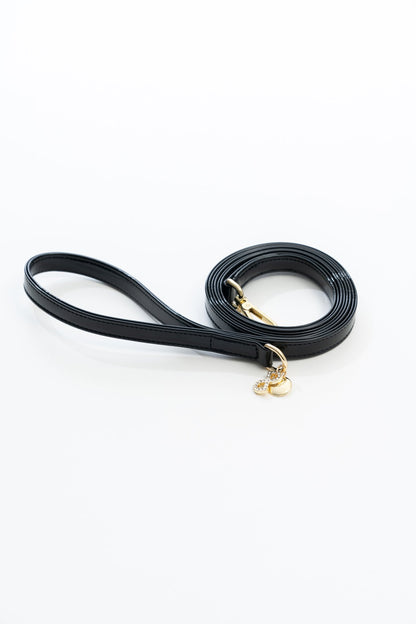 GUINZAGLIO NERO IN VERNICE CON FINITURE ORO